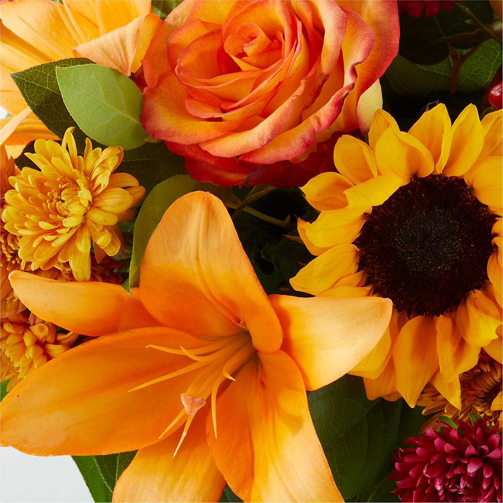 Grateful Centerpiece – J ALEXANDER'S FLORIST, Jackson MI